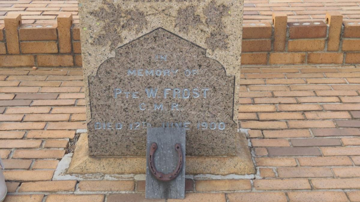 Tombstone of Canadian soldier W. Frost. Note the horseshoe placed there by the visiting descendants.